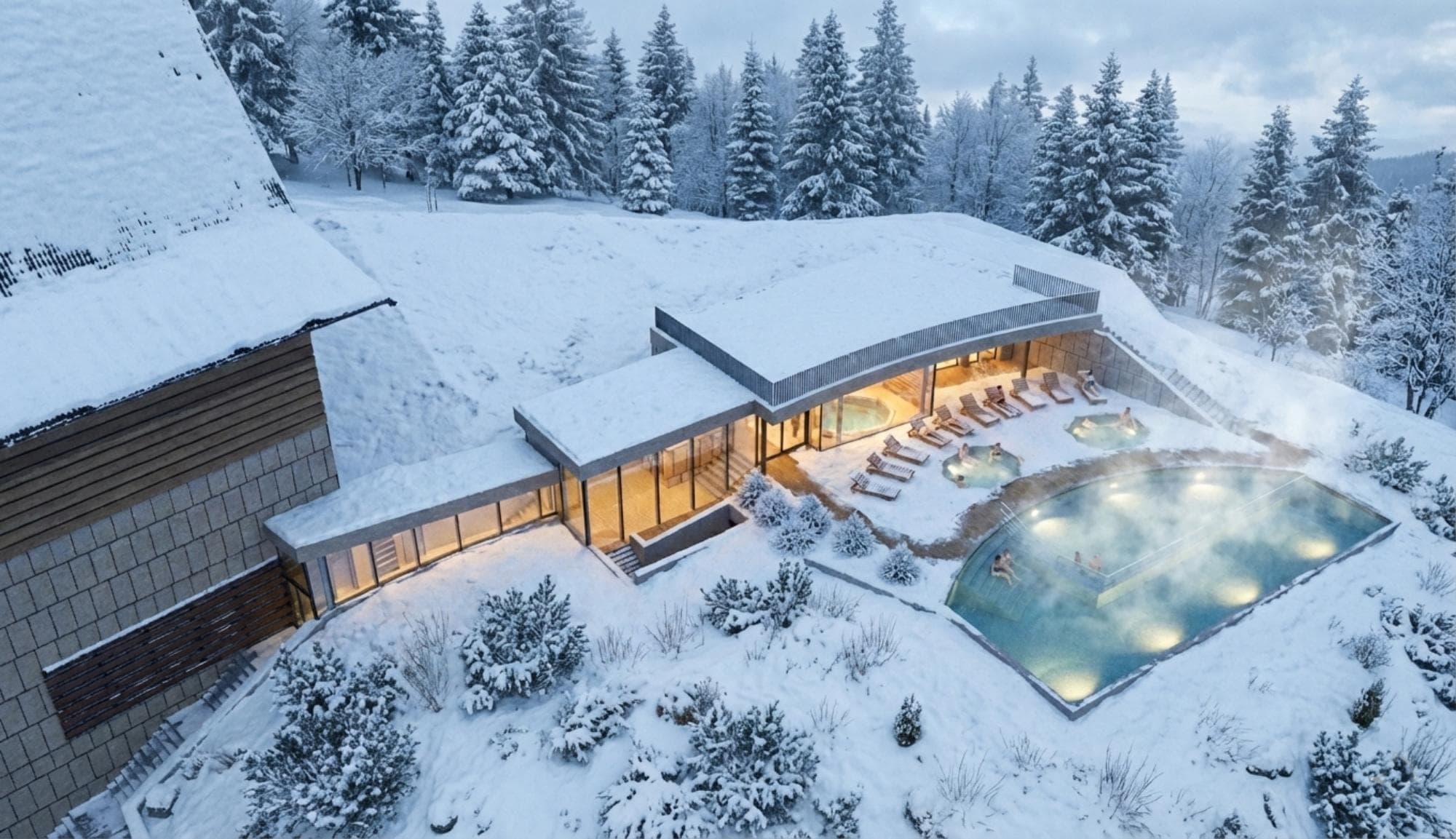 Radisson Zakopane — widok z góry na zewnętrzne baseny termalne w zimowej scenerii