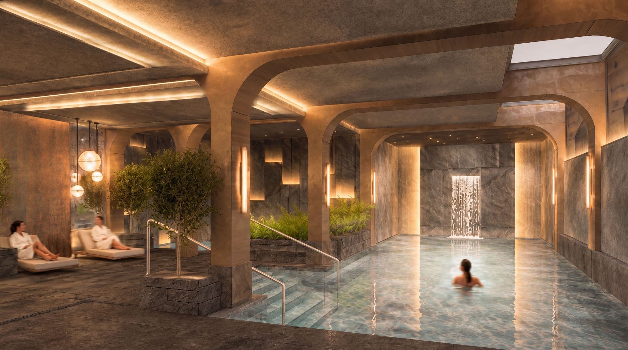 Radisson Zakopane — wewnętrzny basen w stylistyce górskiej groty ze skalnymi łukami